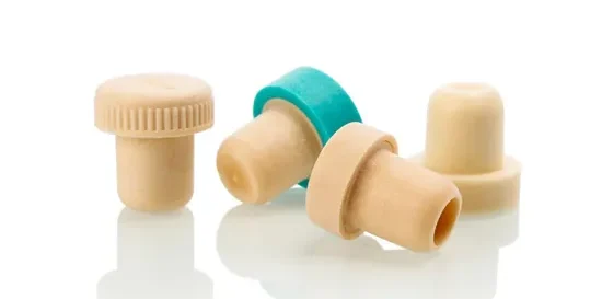 Compare plastic and wooden bar-top stoppers for spirits bottles by cost, fit, branding, testing, supplier capability, and RFQ needs.