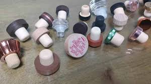 Compare custom printed bar-top stoppers for private label spirits. Learn materials, logo methods, bottle fit, testing, samples, and quote details.